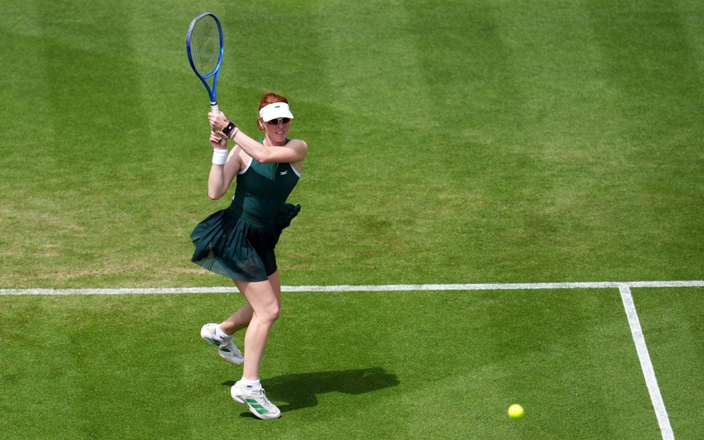 Maya Joint in action against Emma Raducanu during day three of the Lexus Eastbourne Open at Devonshire Park Lawn Tennis Club, Eastbourne