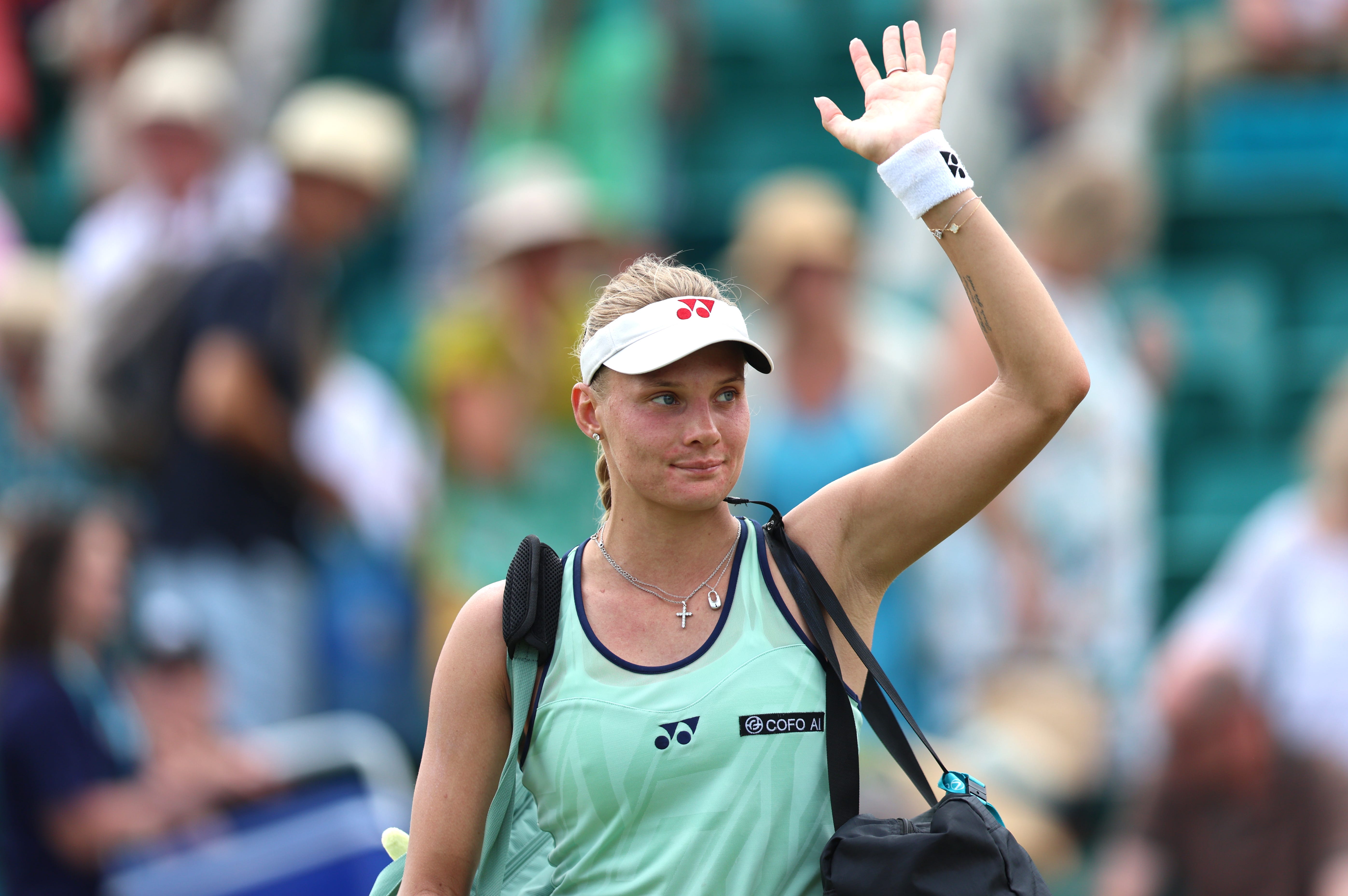 Dayana Yastremska of Ukraine applauds the fans after beating Leylah Fernandez of Canada.