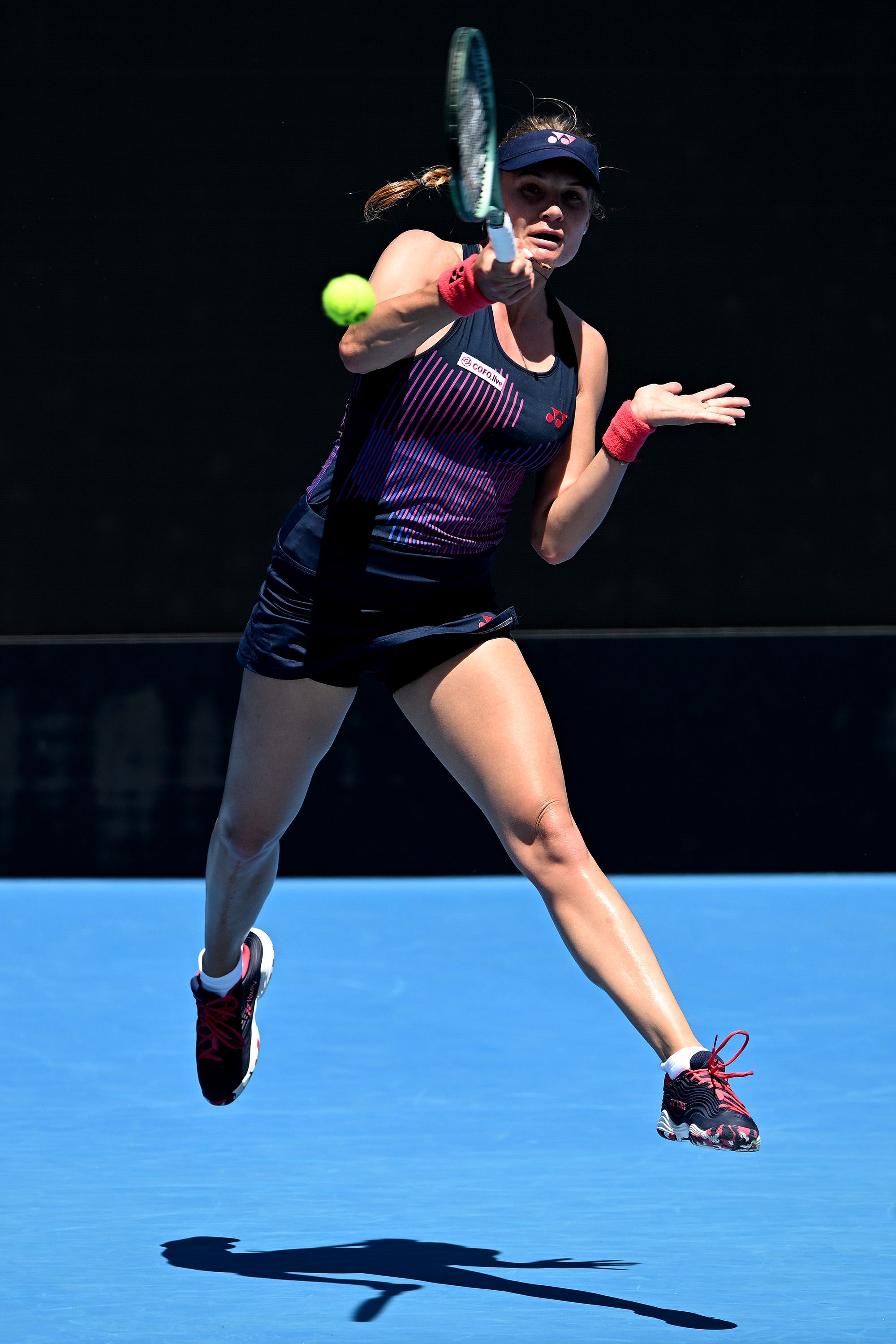 Dayana Yastremska of Ukraine serves in her match against Katie Volynets of USA.