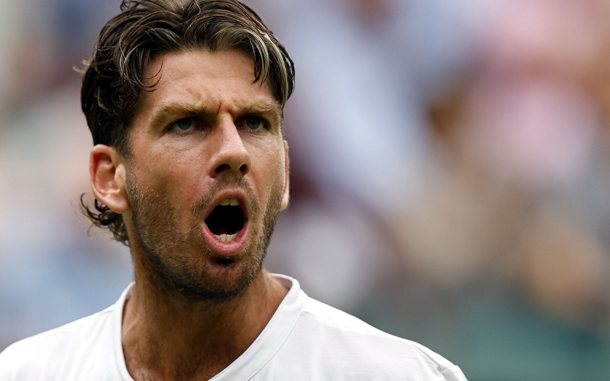Cameron Norrie celebrates winning the point