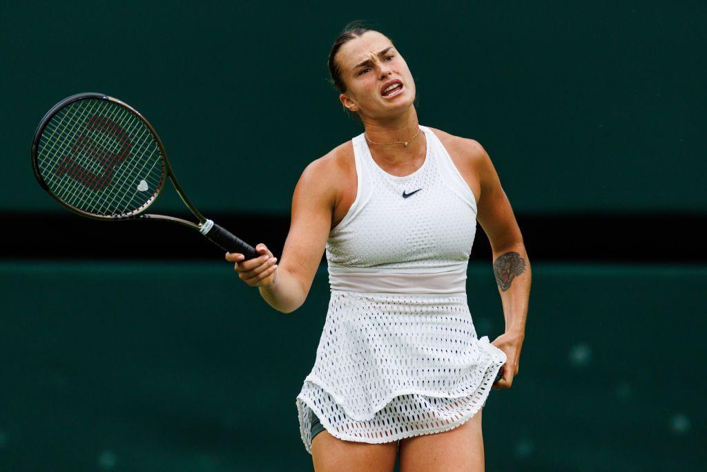 Aryna Sabalenka appears frustrated after a mistake at Wimbledon in 2023