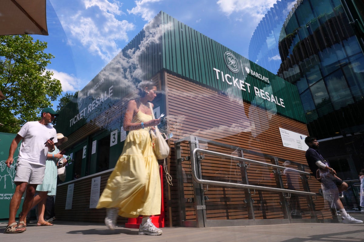 People outside the ticket resale office at the tennis grounds (AP)