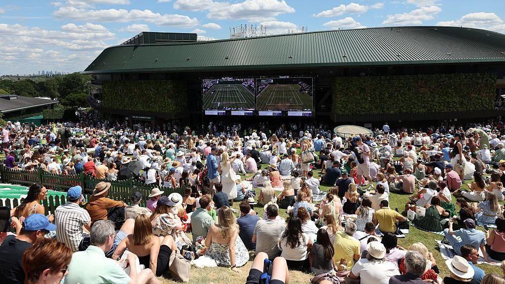 Henman Hill with fans on it