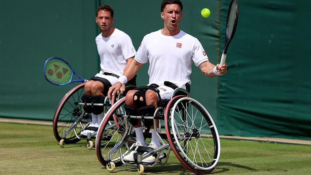 Alfie Hewett and Gordon Reid in action