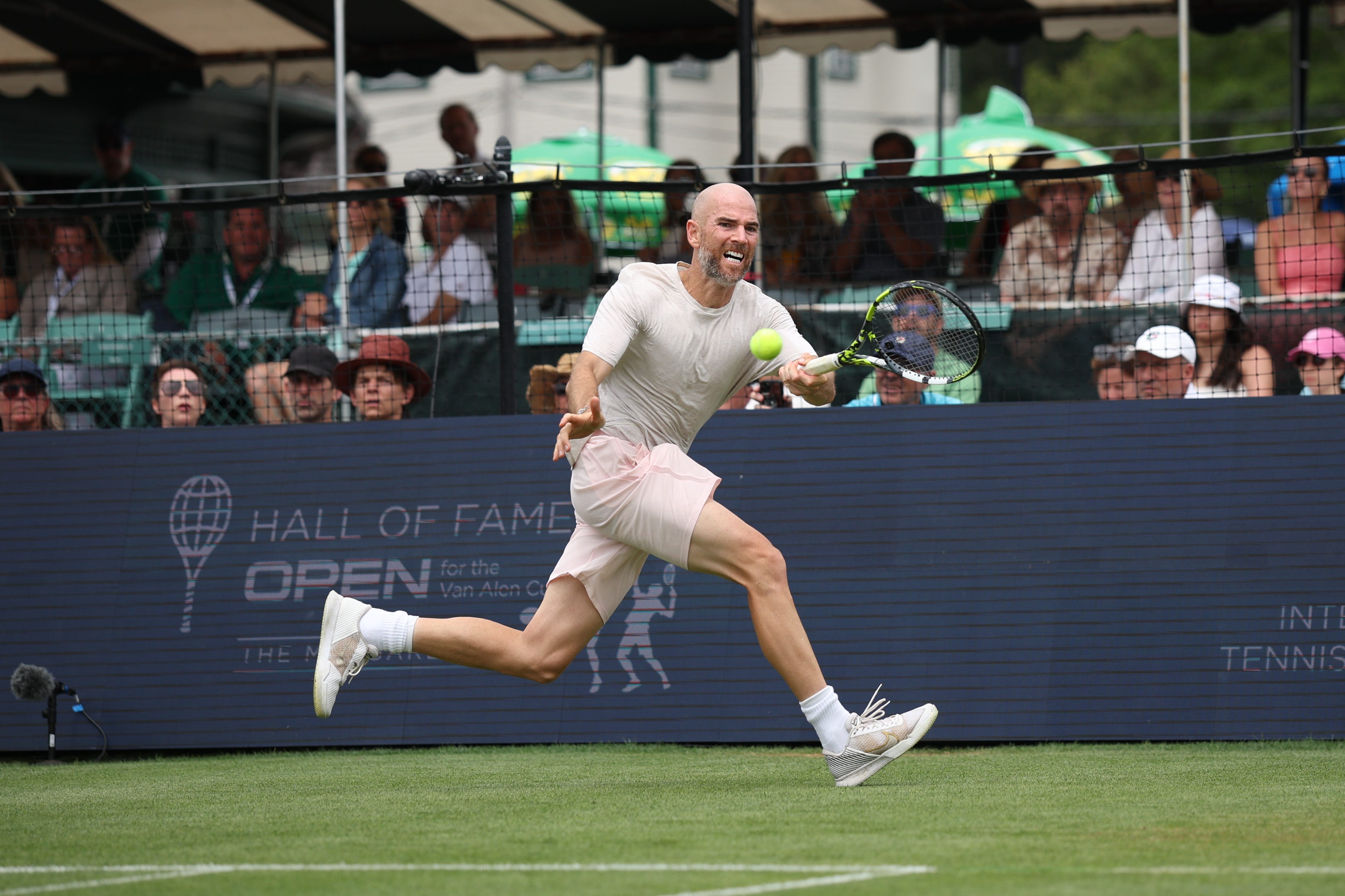 Adrian Mannarino hits a return at the Hall of Fame Open in Newport on July 12.