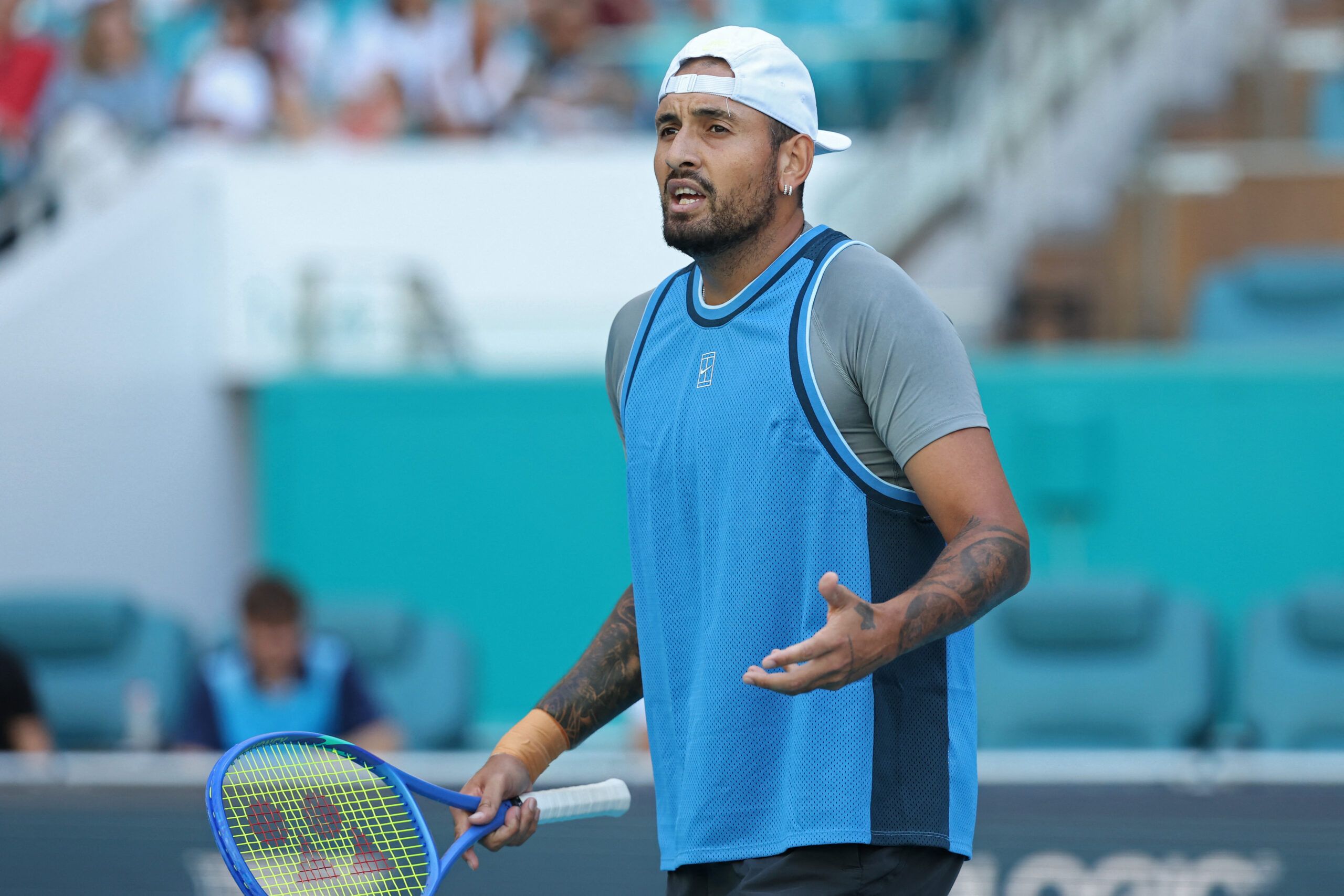 Mar 19, 2025; Miami, FL, USA; Nick Kyrgios (AUS) reacts towards his player's box after losing a point against Mackenzie McDonald (USA)(not pictured) on day two of the Miami Open at Hard Rock Stadium. © Geoff Burke-Imagn Images