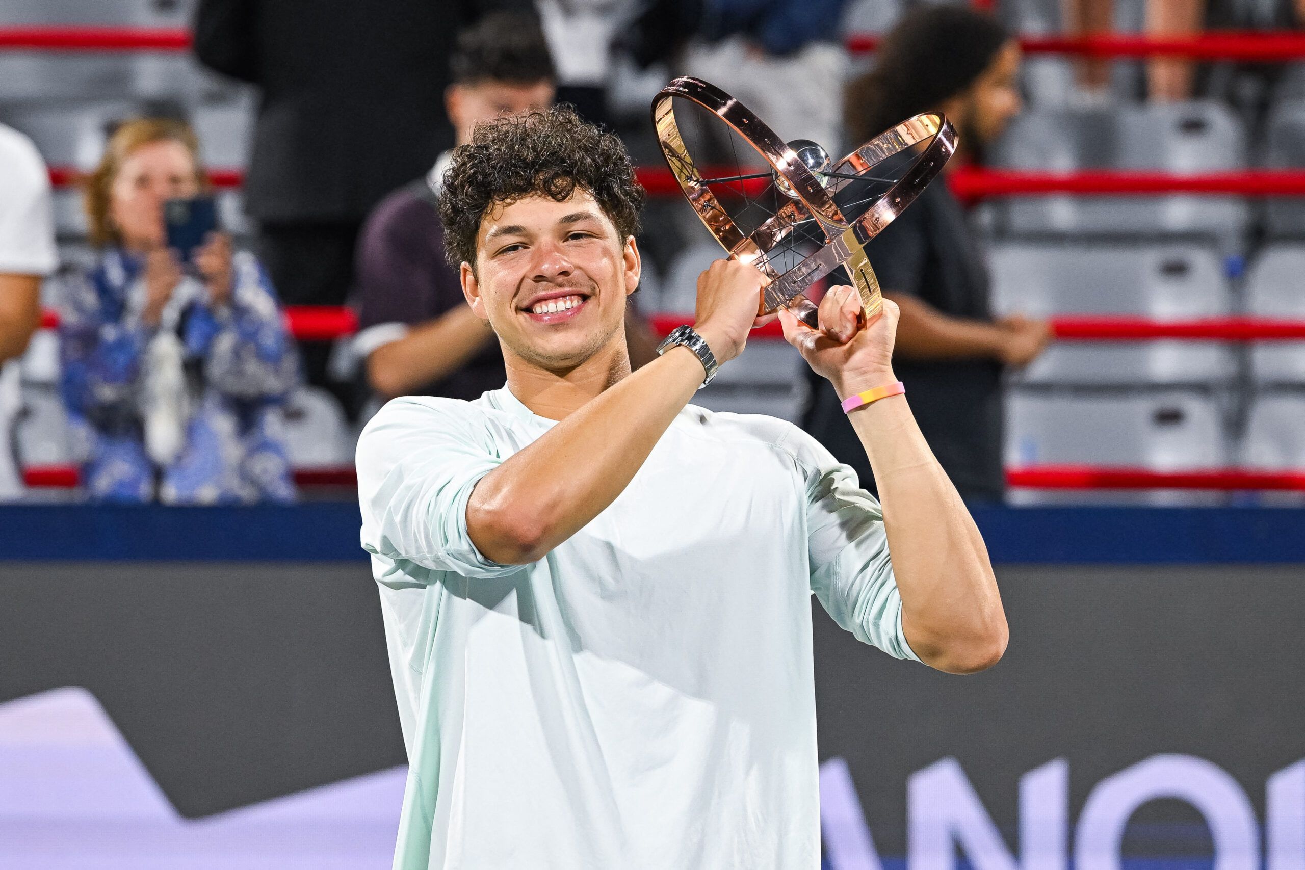 Aug 13, 2026; Montreal, QC, Canada; Ben Shelton (USA) winner of the singles final holds his trophy at IGA Stadium. © David Kirouac-Imagn Images