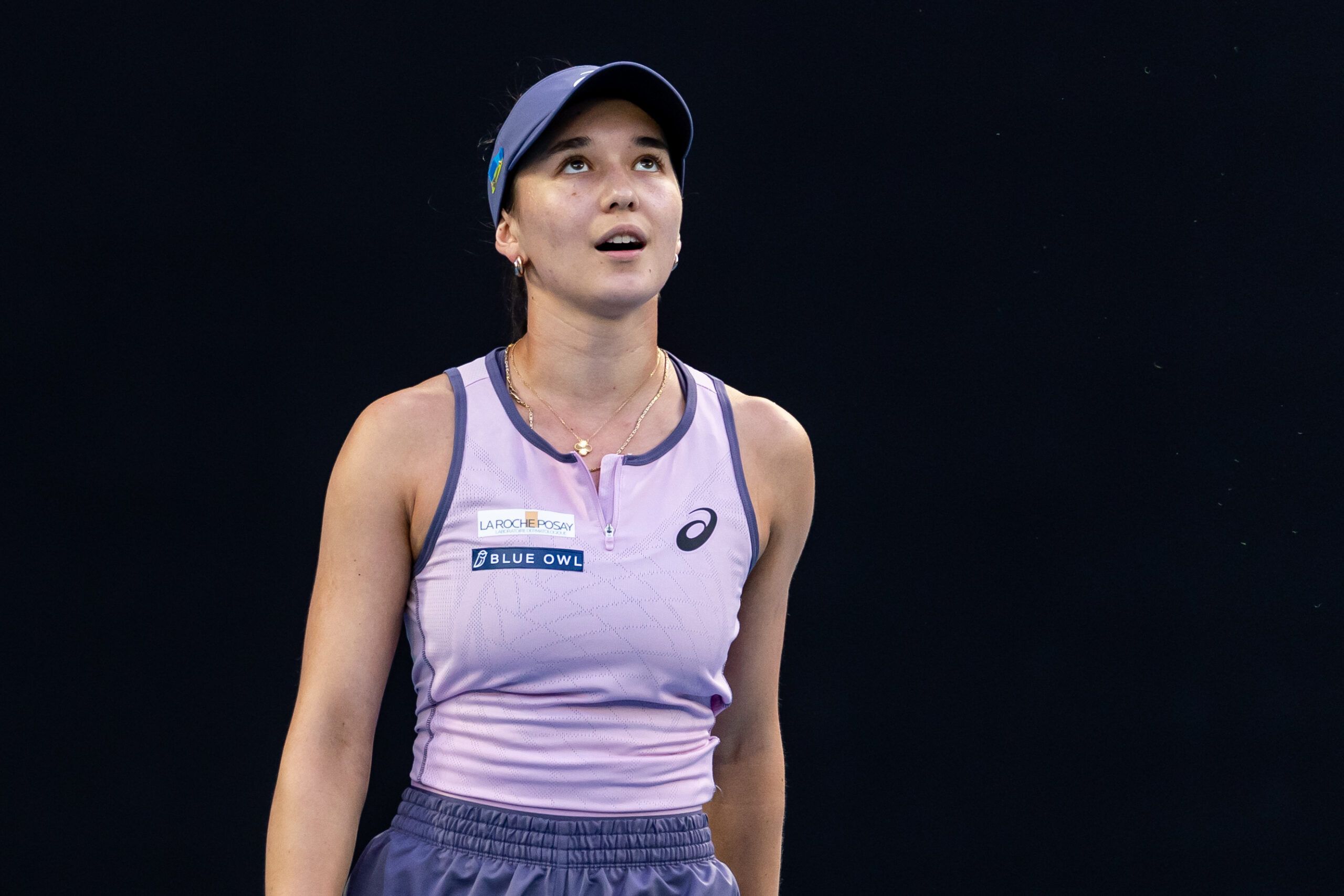 Jan 20, 2025; Melbourne, Victoria, Australia; Eva Lys of Germany gestures during her match against Iga Swiatek of Poland in the fourth round of the women's singles at the 2025 Australian Open at Melbourne Park. © Mike Frey-Imagn Images