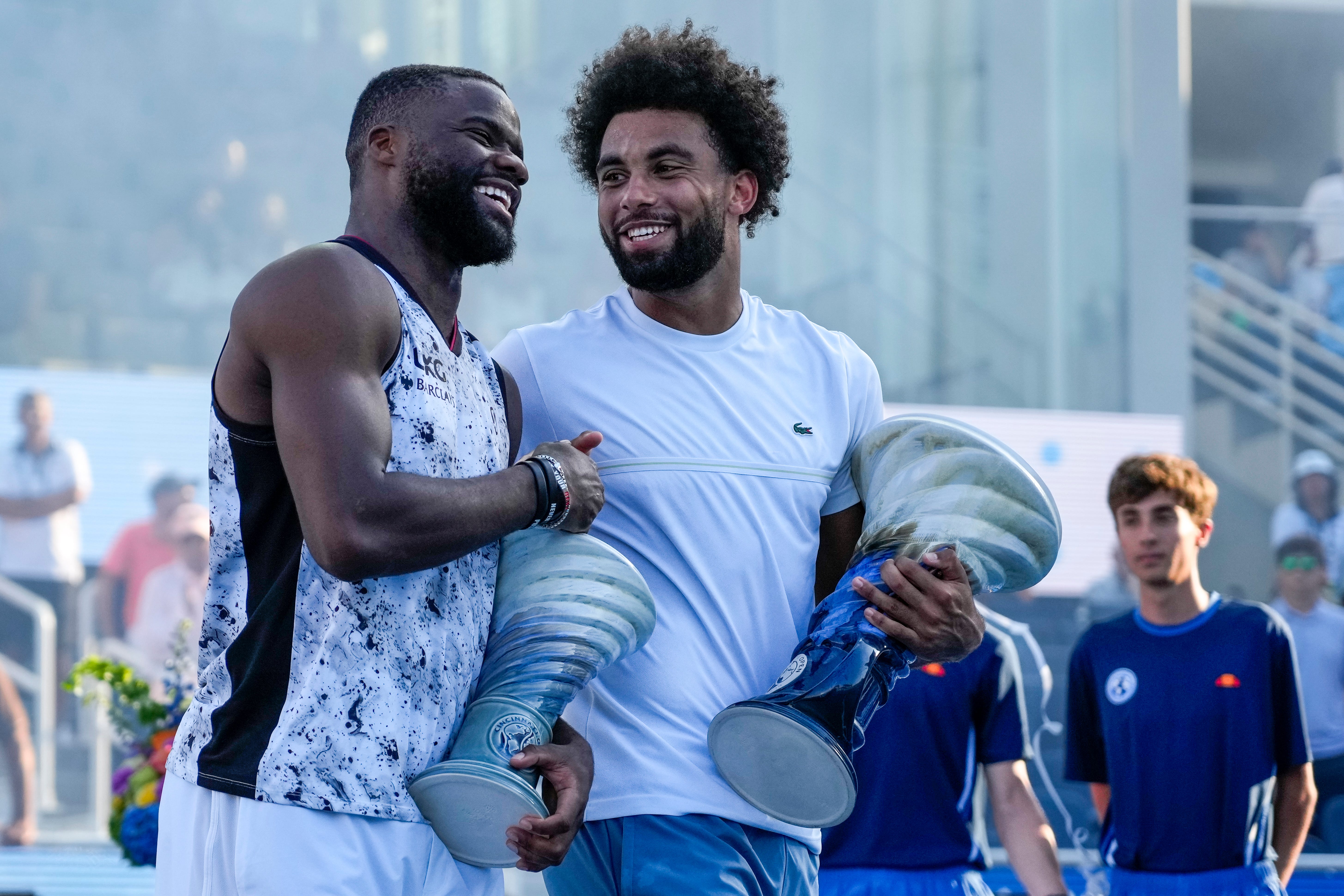 Frances Tiafoe and Arthur Fils celebrate after the Cincinnati Open Finals match between Arthur Fils, of France, and Frances Tiafoe, of the United States, at the Lindner Family Tennis Center in Mason, Ohio, on Sunday, Aug. 23, 2026. Fils won the championship, 6-3, 1-6, 6-0.