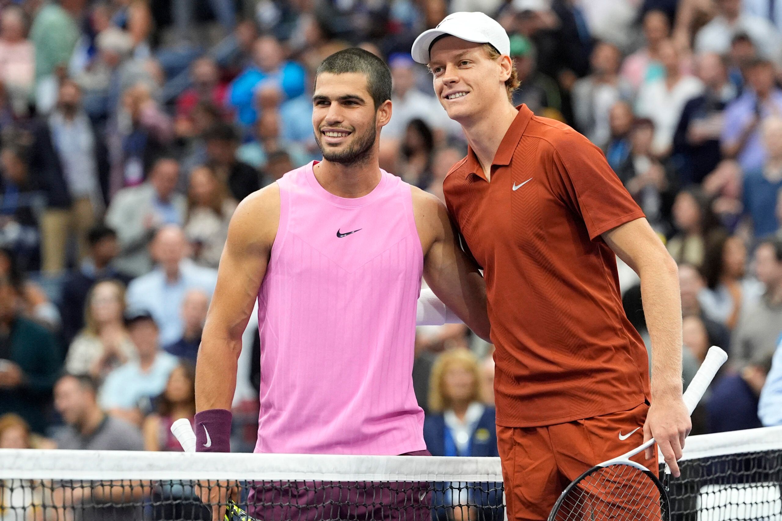 Sep 7, 2025; Flushing, NY, USA; Carlos Alcaraz (ESP) and Jannik Sinner (ITA) pose for a photos a the net prior to the final of mens singles at Billie Jean King National Tennis Center. © Robert Deutsch-Imagn Images