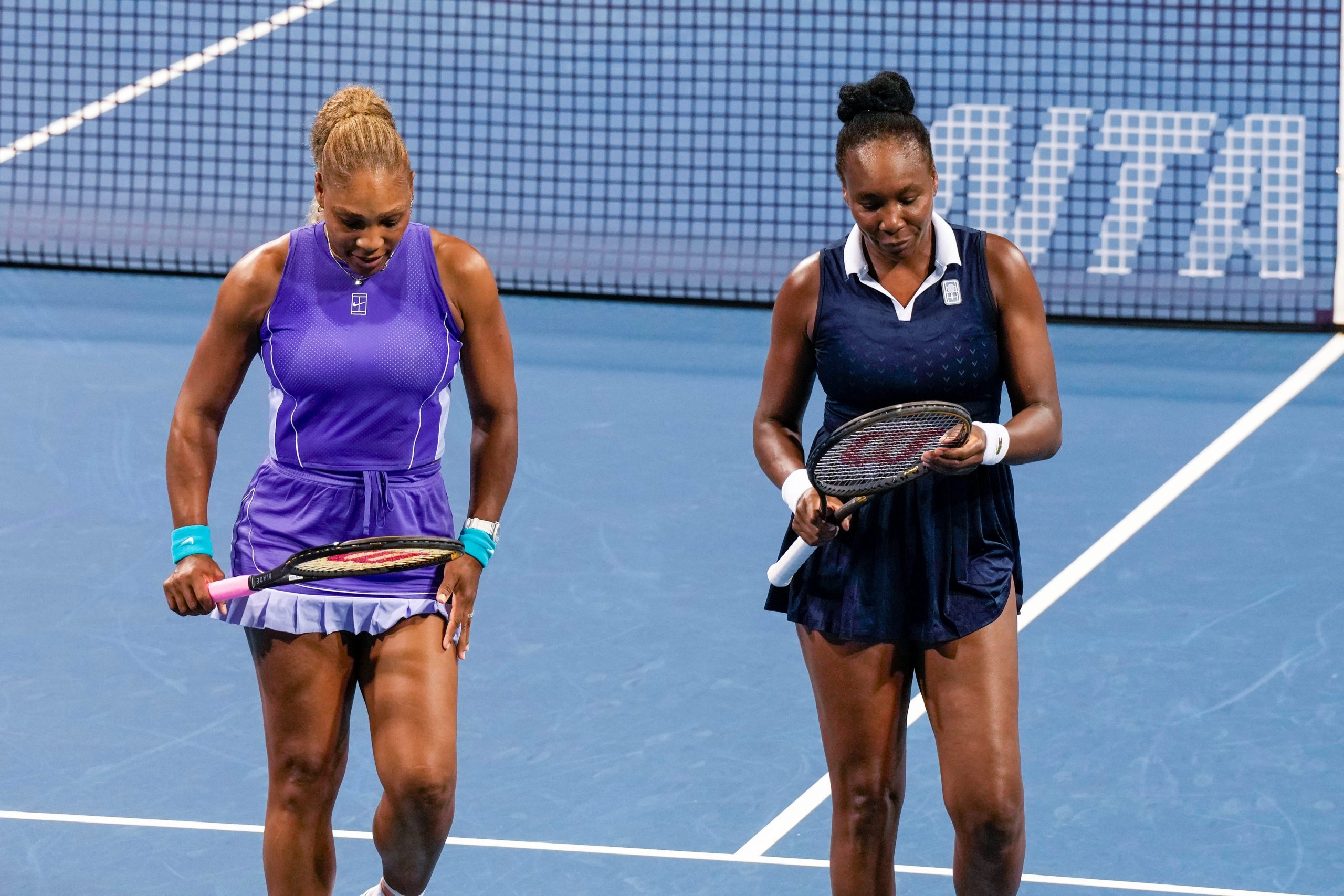 Serena Williams and her sister, Venus Williams, compete in a doubles match during the Cincinnati Open at the Lindner Family Tennis Center in Mason on Aug. 17, 2026. The sisters fell to Marta Kostyuk and Peyton Stearns, 6-2, 1-6, 10-8.