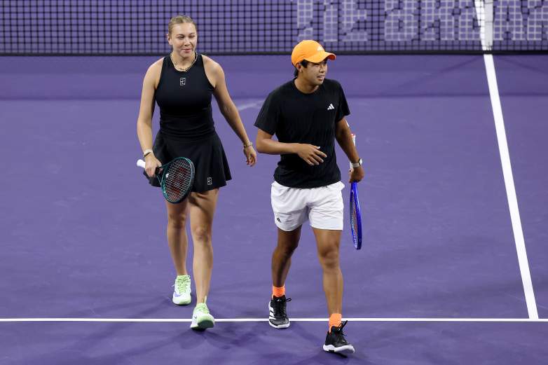 INDIAN WELLS, CALIFORNIA - MARCH 03: Amanda Anisimova and Learner Tien of the United States play Emma Navarro and Ben Shelton of the United States in the Eisenhower Cup during the BNP Paribas Open at the Indian Wells Tennis Garden on March 03, 2026 in Indian Wells, California. (Photo by Matthew Stockman/Getty Images)