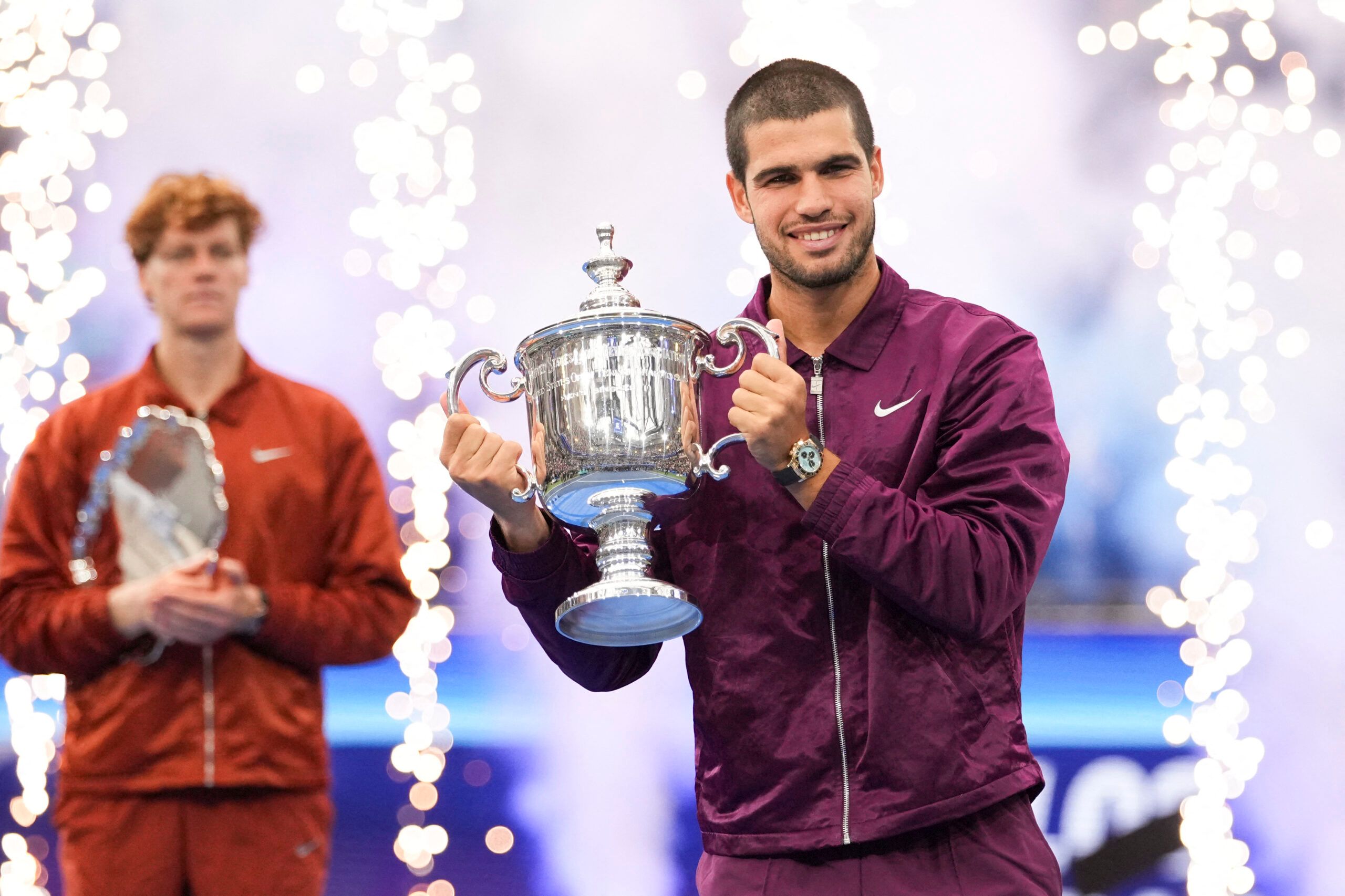 Sep 7, 2025; Flushing, NY, USA; Carlos Alcaraz (ESP) holds the trophy after defeating Jannik Sinner (ITA) in the final of mens singles at Billie Jean King National Tennis Center. © Robert Deutsch-Imagn Images