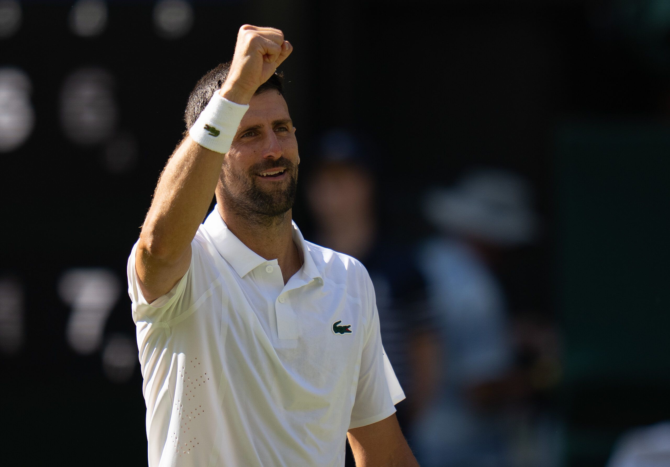 Jul 3, 2026; London, United Kingdom; Novak Djokovic of Serbia celebrates winning his match against Arthur Rinderknech of France on day five at All England Lawn Tennis and Croquet Club. © Susan Mullane-Imagn Images