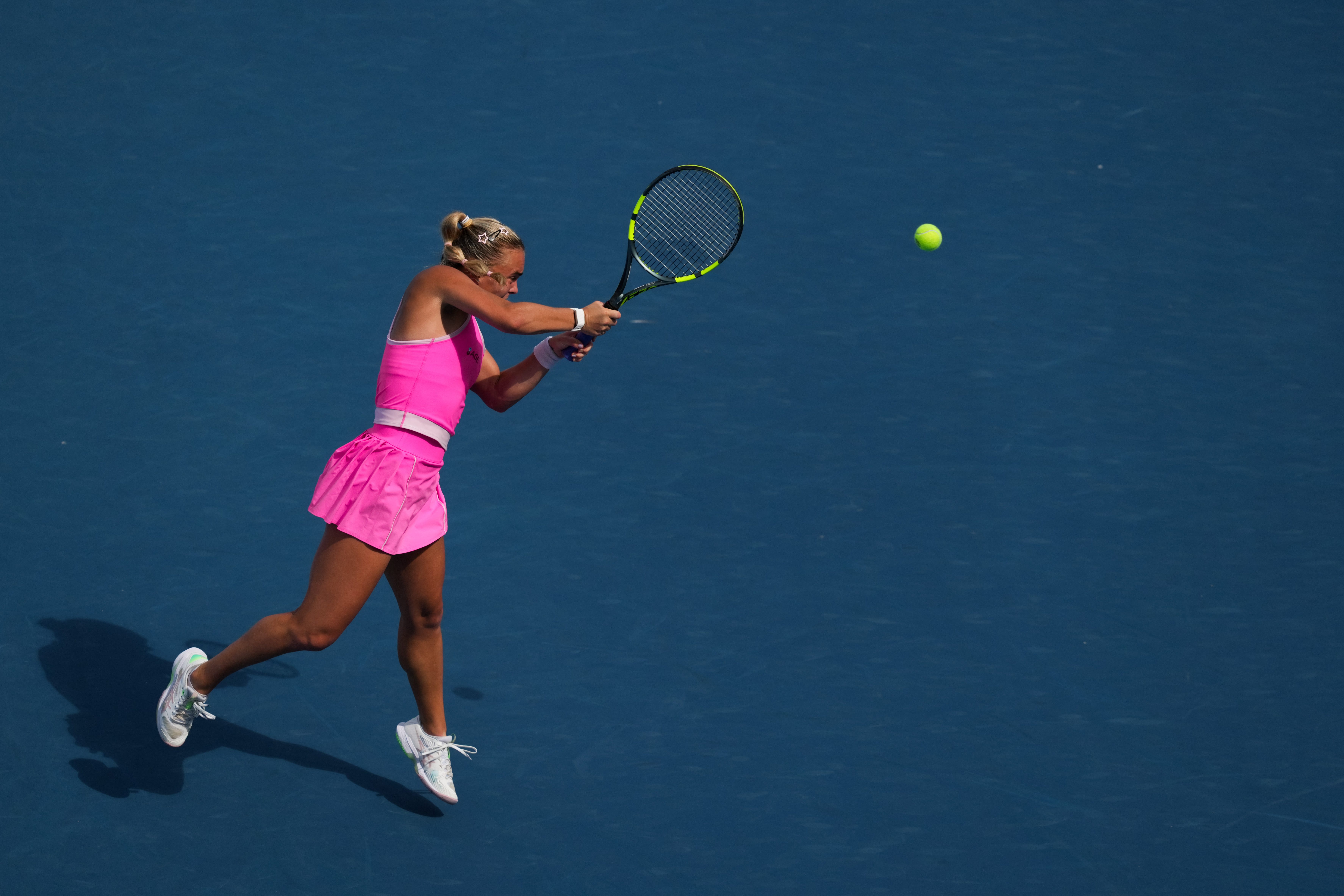 Sara Bejlek returns a shot against Madison Keys during the Cincinnati Open at Lindner Family Tennis Center.