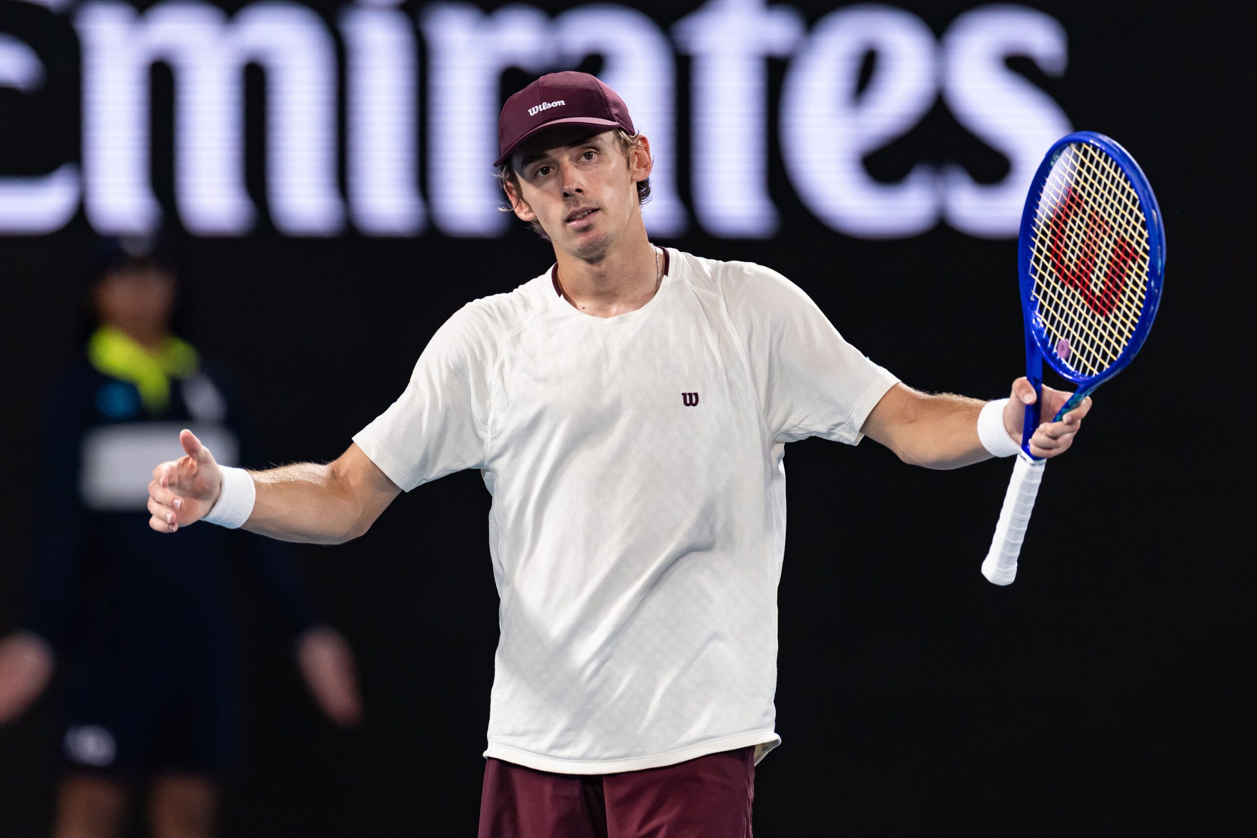 Jan 27, 2026; Melbourne, Victoria, Australia; Alex de Minaur of Australia in action against Carlos Alcaraz of Spain in the quarterfinals of the men’s singles at the Australian Open at Rod Laver Arena in Melbourne Park. © Mike Frey-Imagn Images