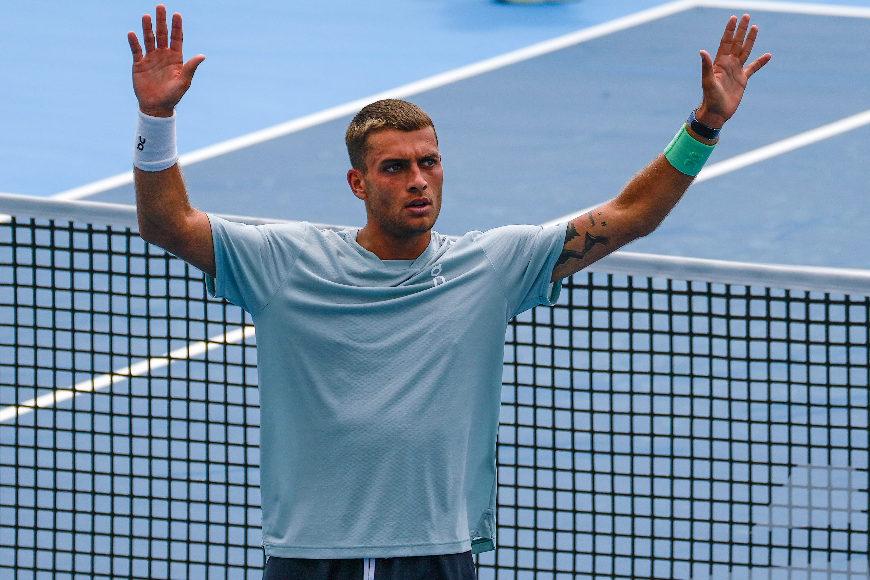 Flavio Cobolli celebrates a win over Alexander Blockx in round three of the Cincinnati Open at the Lindner Family Tennis Center in Mason, Ohio, on Monday, Aug. 17, 2026. Cabolli advanced with a 7-5, 4-6, 7-5 win.