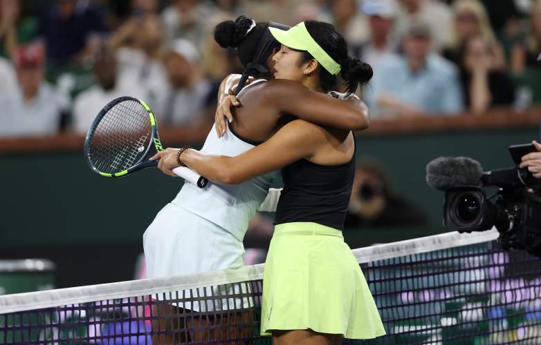 INDIAN WELLS, CALIFORNIA - MARCH 08: Coco Gauff of the United States at the net with Alexandra Eala of the Phiippines after she has retired with an arm injury from their third round match of the BNP Paribas Open at Indian Wells Tennis Garden on March 08, 2026 in Indian Wells, California. (Photo by Clive Brunskill/Getty Images)