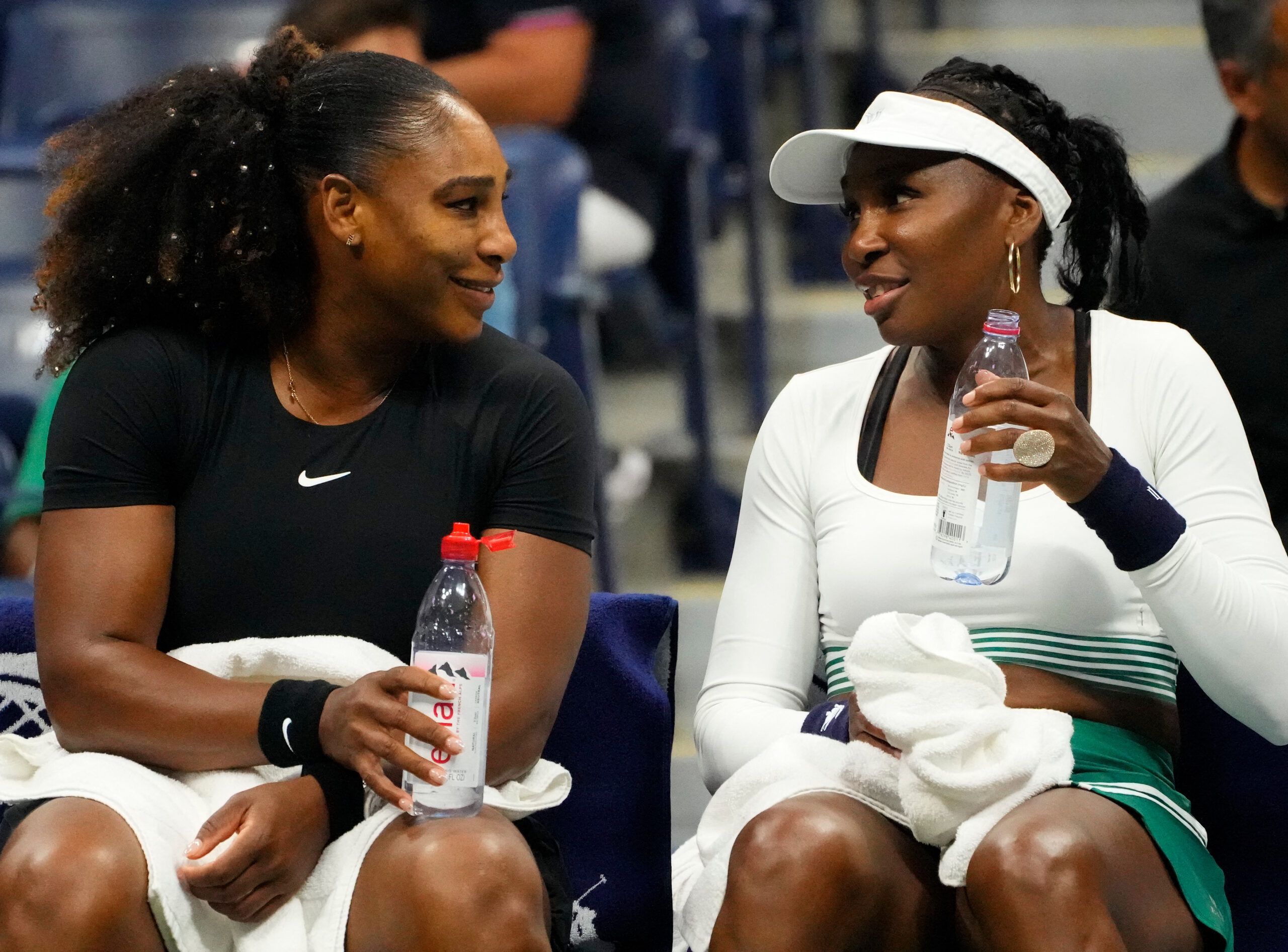 Sept 1, 2022; Flushing, NY, USA; Serena Williams and Venus Williams of the USA on a change of ends as they play Lucie Hradecka and Linda Noskova of the Czech Republic in in women's doubles on day four of the 2022 U.S. Open tennis tournament at USTA Billie Jean King National Tennis Center. © Robert Deutsch-USA TODAY Sports