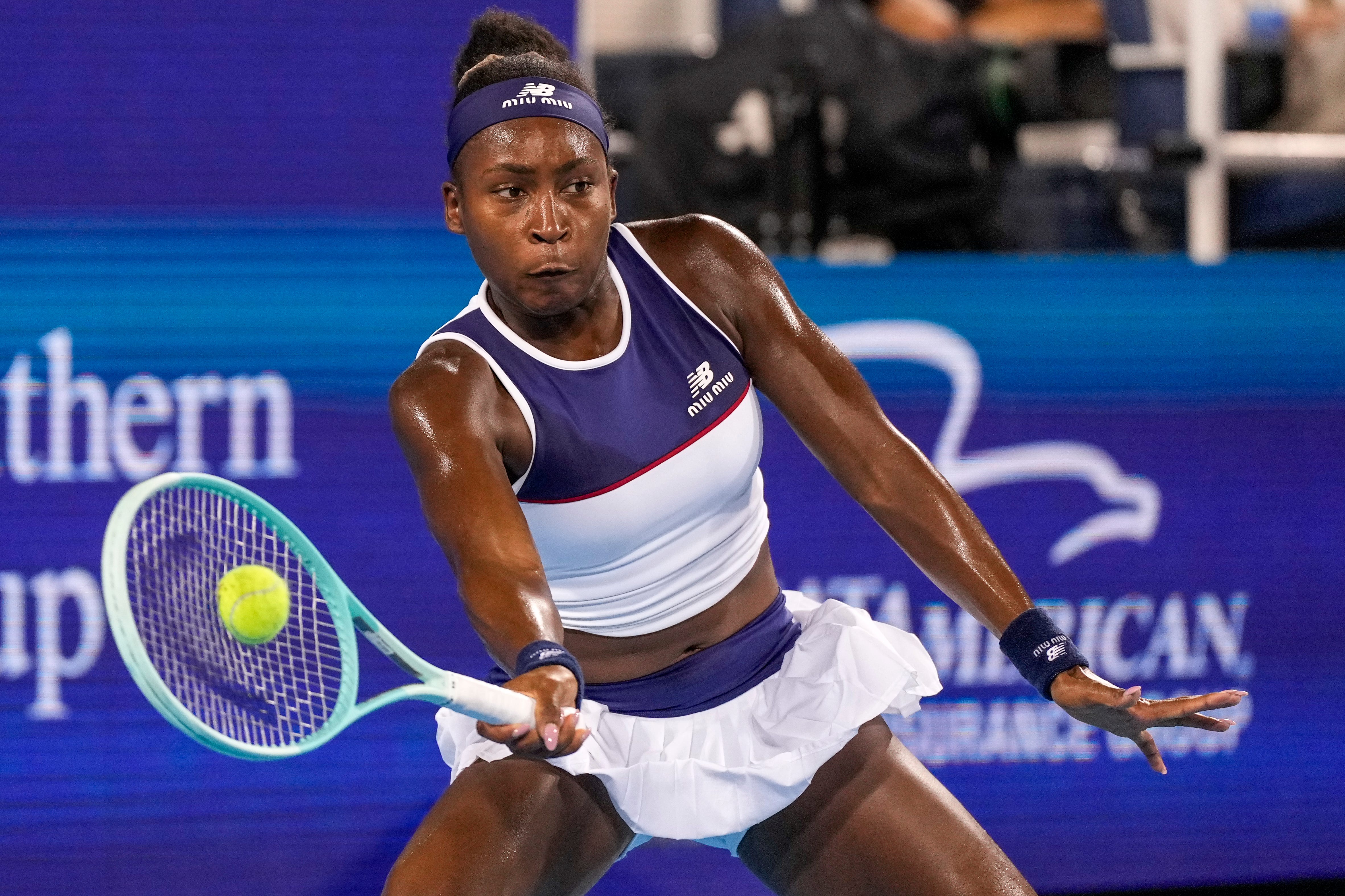 Coco Gauff returns a shot in the Cincinnati Open quarterfinal match between Coco Gauff and Jasmine Paolini at the Lindner Family Tennis Center in Mason, Ohio, on Friday, Aug. 15, 2025. Paolini won 2-6, 6-4, 6-3.
