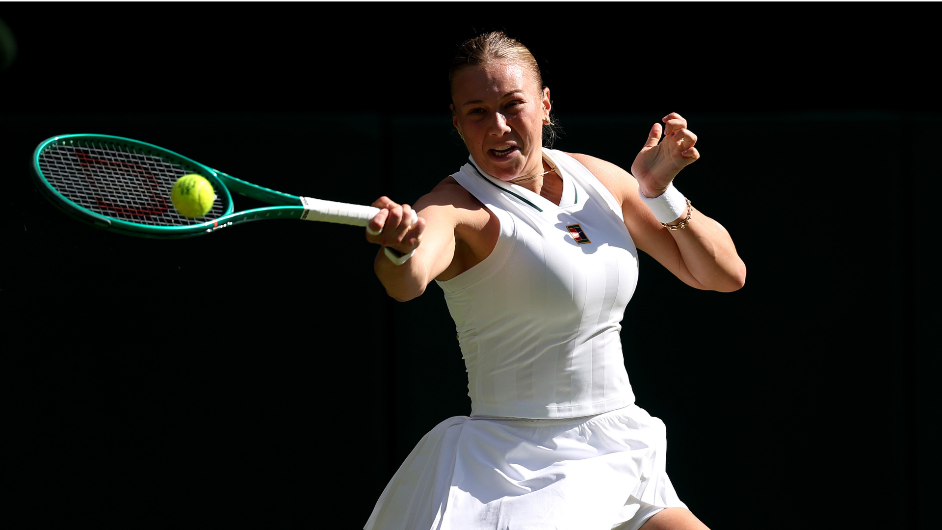 LONDON, ENGLAND - JULY 04: Amanda Anisimova of United States plays a forehand against Madison Keys of United States during their Ladies' Singles third round match on day six of The Championships Wimbledon 2026 at All England Lawn Tennis and Croquet Club on July 04, 2026 in London, England. (Photo by Clive Brunskill/Getty Images)