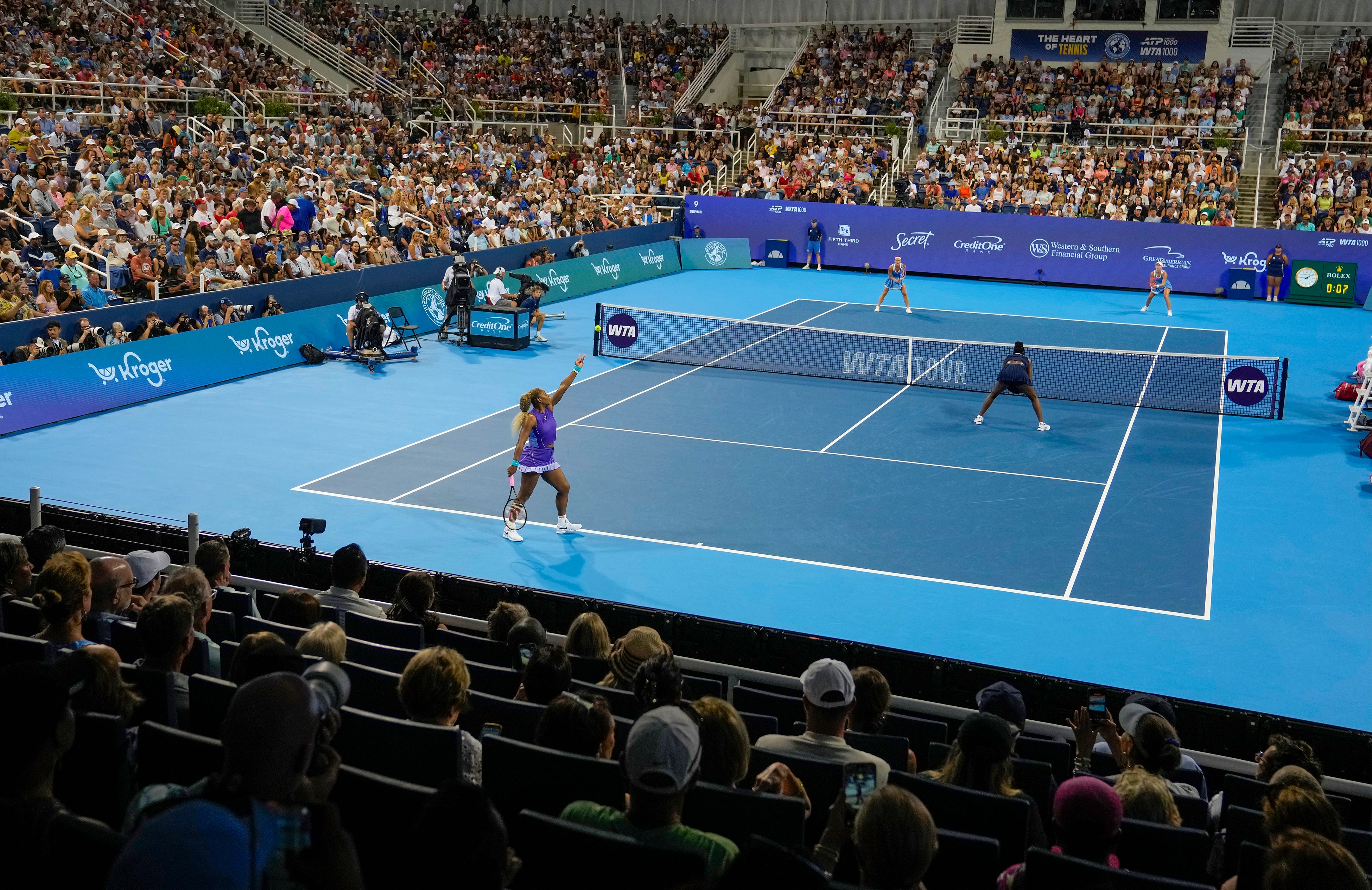 Serena Williams serves as she and her sister, Venus Williams, face Marta Kostyuk and Peyton Stearns during the Cincinnati Open at the Lindner Family Tennis Center in Mason on Aug. 17, 2026.