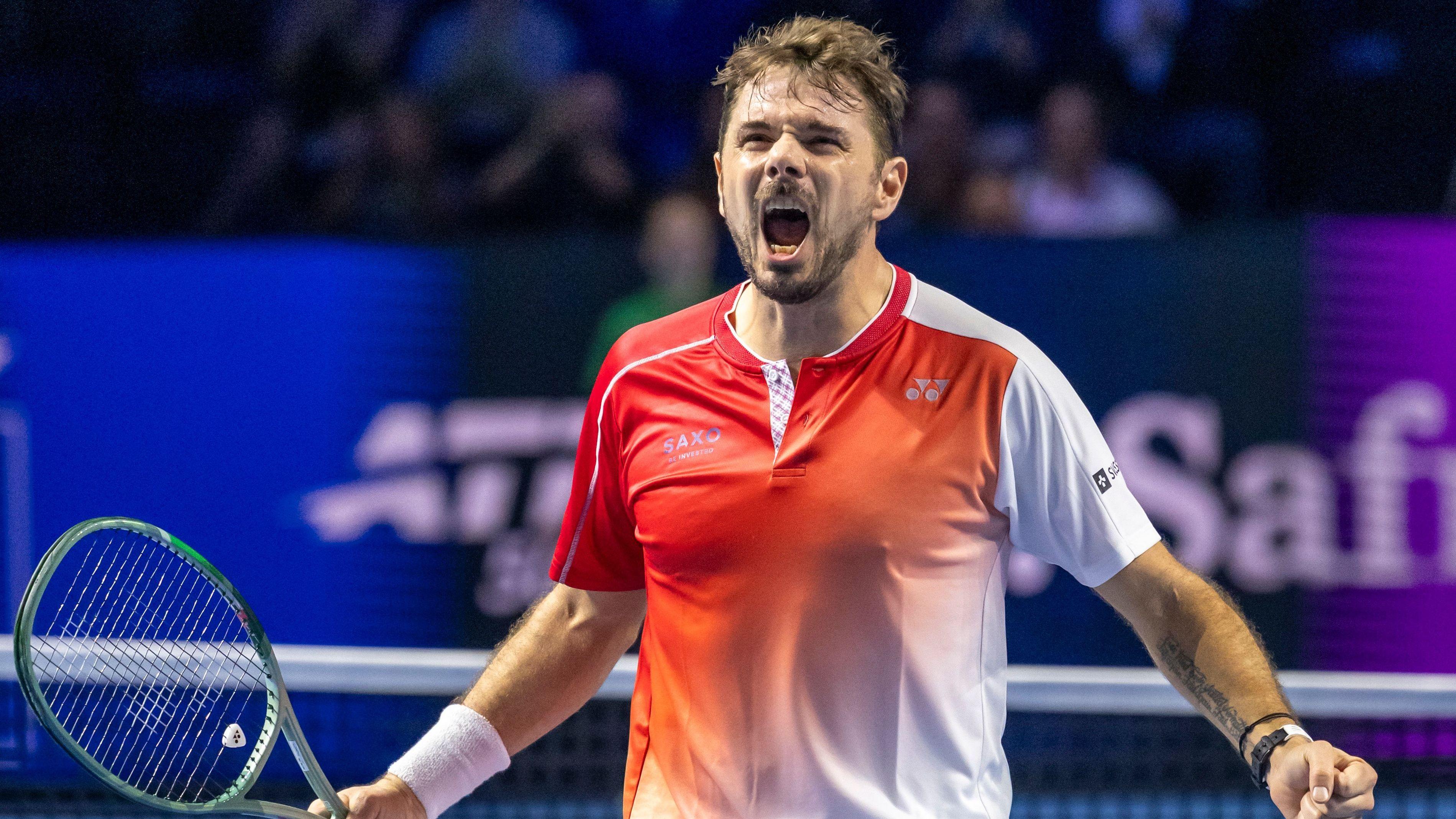 Stan Wawrinka roars in celebration at the Swiss Indoors event in Basel