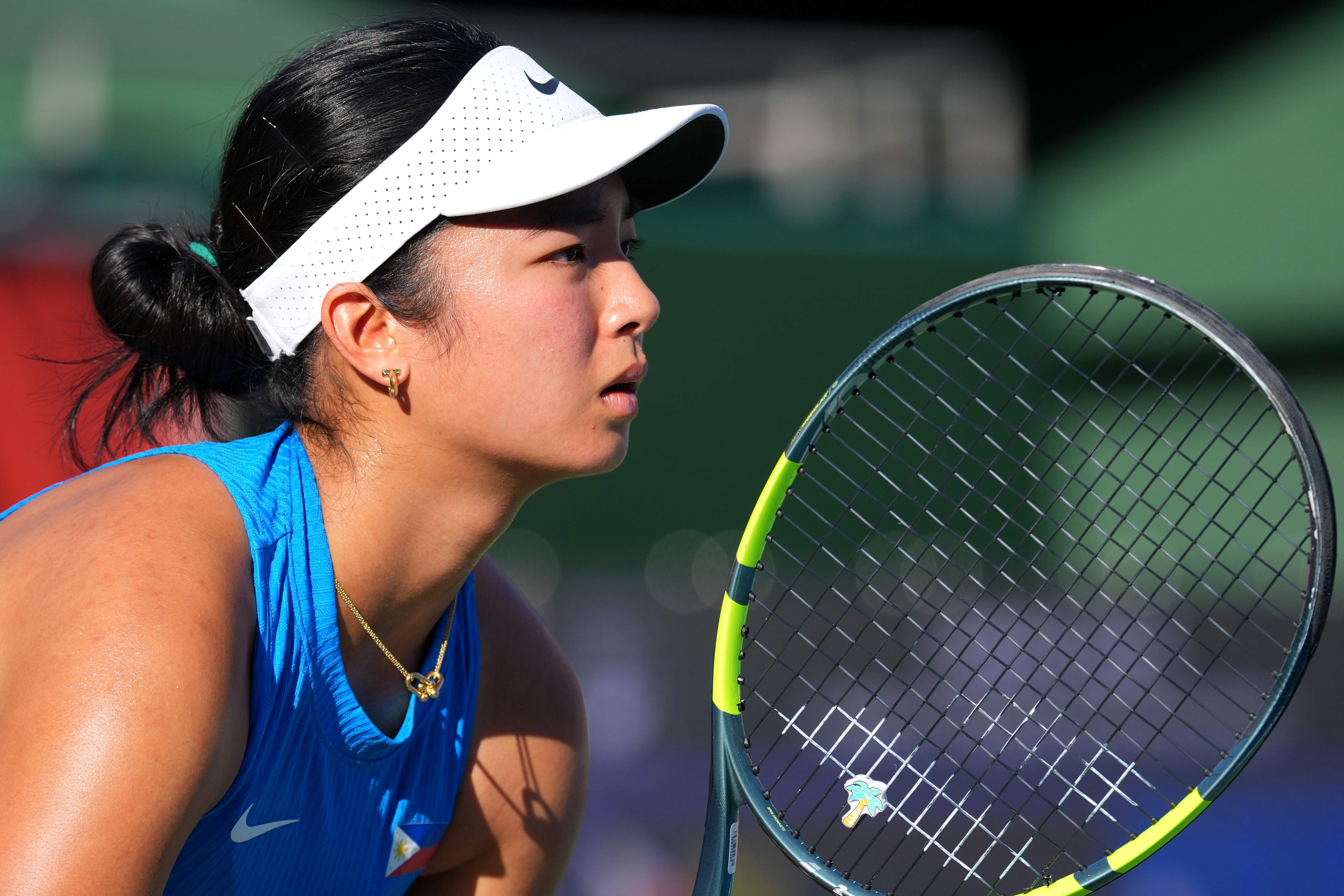 NAGOYA, JAPAN - OCTOBER 01: Eala Alexandra of Philippines looks on against Wang Xiyu of China in their Tennis Women's singles semi-finals on day twelve of the 20th Asian Games Aichi-Nagoya at Nagoya City Higashiyama Park Tennis Center on October 01, 2026 in Nagoya, Aichi, Japan. (Photo by Yuichi Masuda/Getty Images)