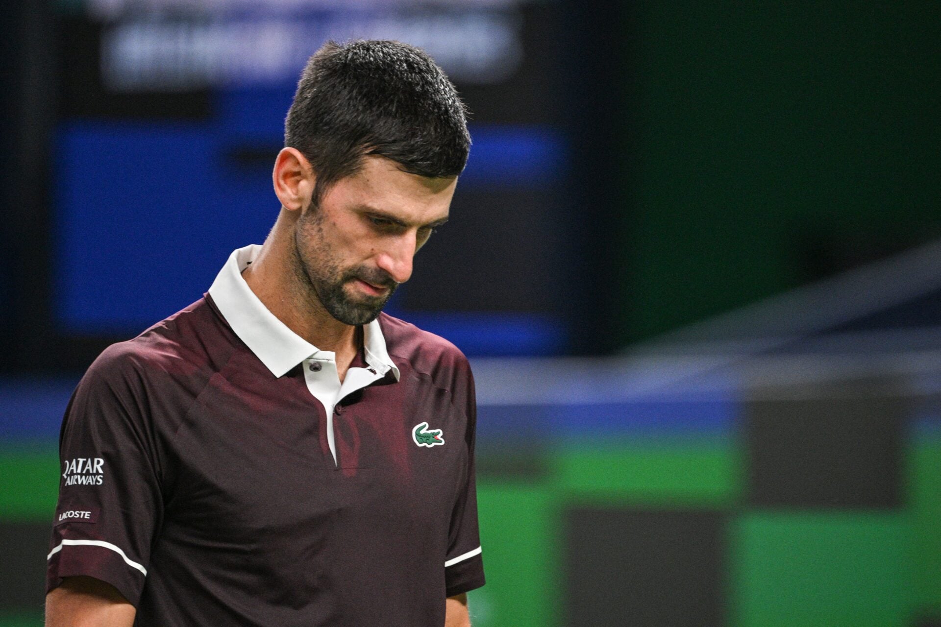 Novak Djokovic looks downbeat